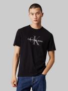 NU 20% KORTING: Calvin Klein T-shirt SS Hero Monogram Tee 30S EU Opt