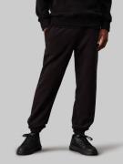 NU 20% KORTING: Calvin Klein Joggingbroek CHENILLE MONOLOGO SWEATPANT