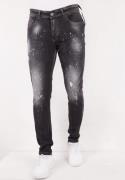 True Rise Black ripped paint splatter slim fit jeans dc