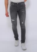 True Rise Slim fit jeans met scheuren dc